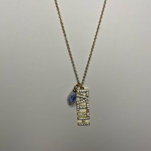 Gold “faith” necklace